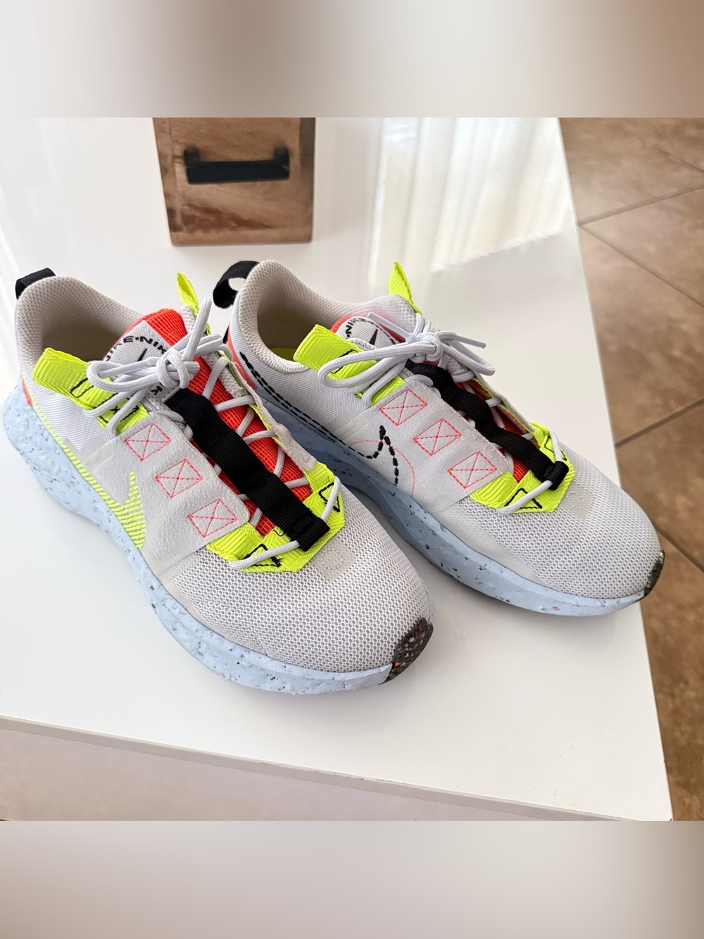 Nike Women's White Sneakers with Neon Yellow and Black Accents
